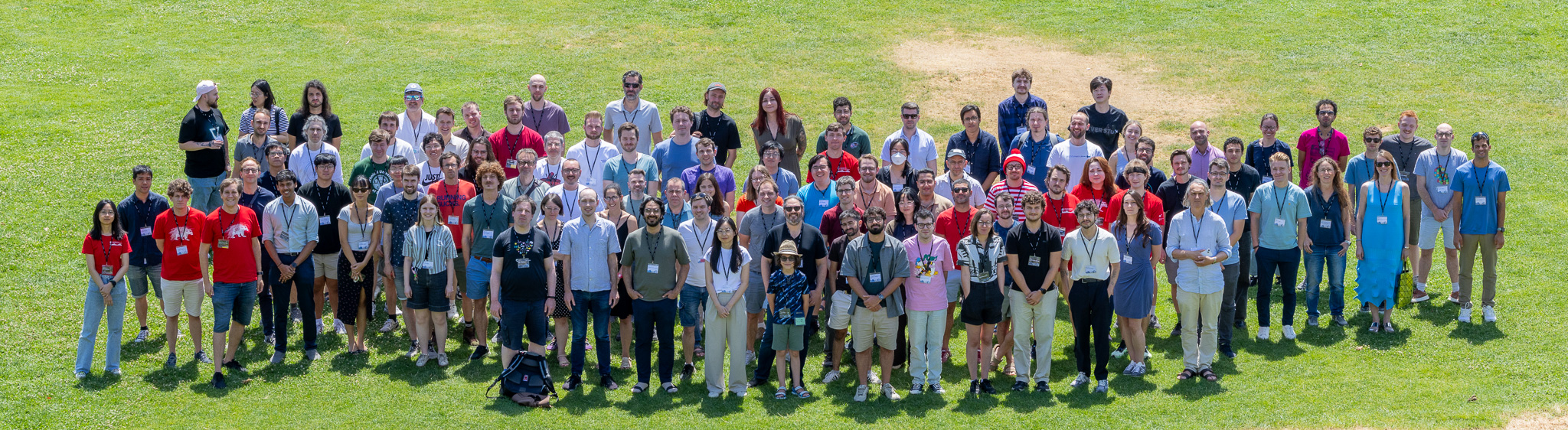 SGP 2026 group photo on lawn photographed from above